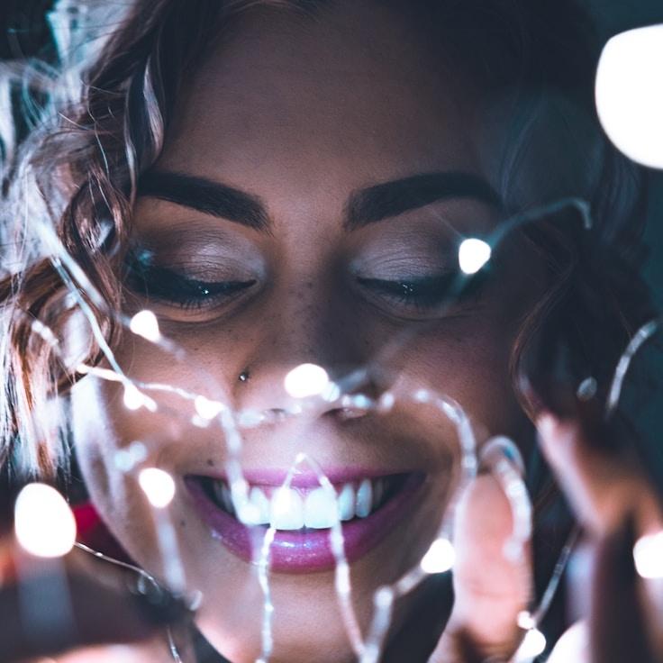 Asha Kapoor, Lead Design Curator at Meadow Pulse Note, reviewing corporate floral arrangements